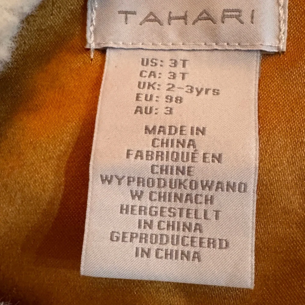 Tahari Faux Fur Vest in Cream and Tan